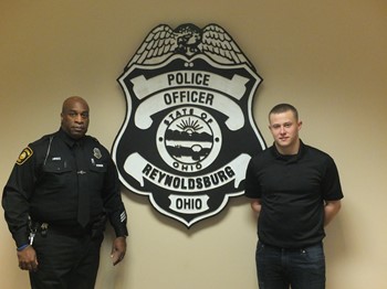 Officer Hines and Brandon at the RPD