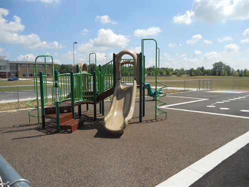 photo of equipment on smaller kindergarten playground. 