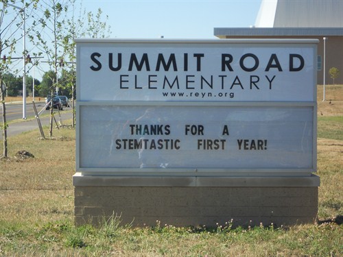 front street sign following our first year, stating "thanks for a stemtastic first year!"