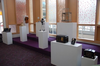 photo of many displays of antique technology of radios, computers, etc. 