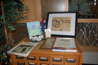 photo of old card catalog with U.S. president display on top. 