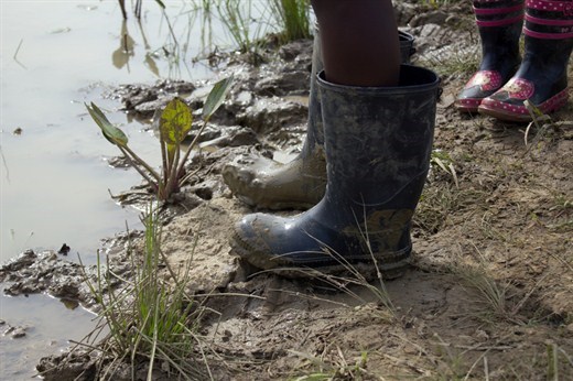 rubber boots in the mud