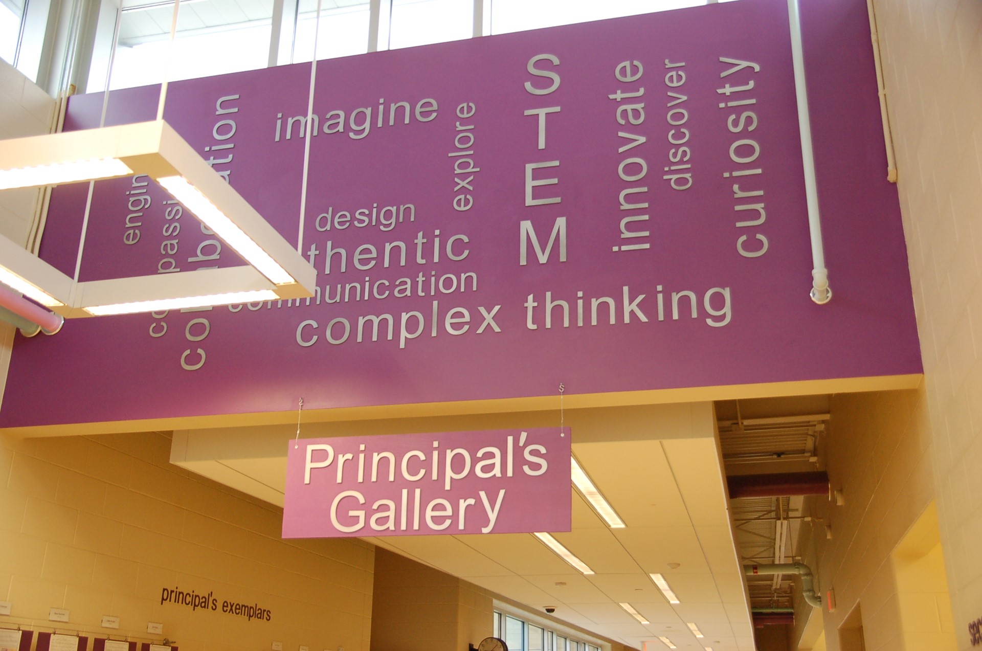 photo of ceiling words posted in principal's gallery. 