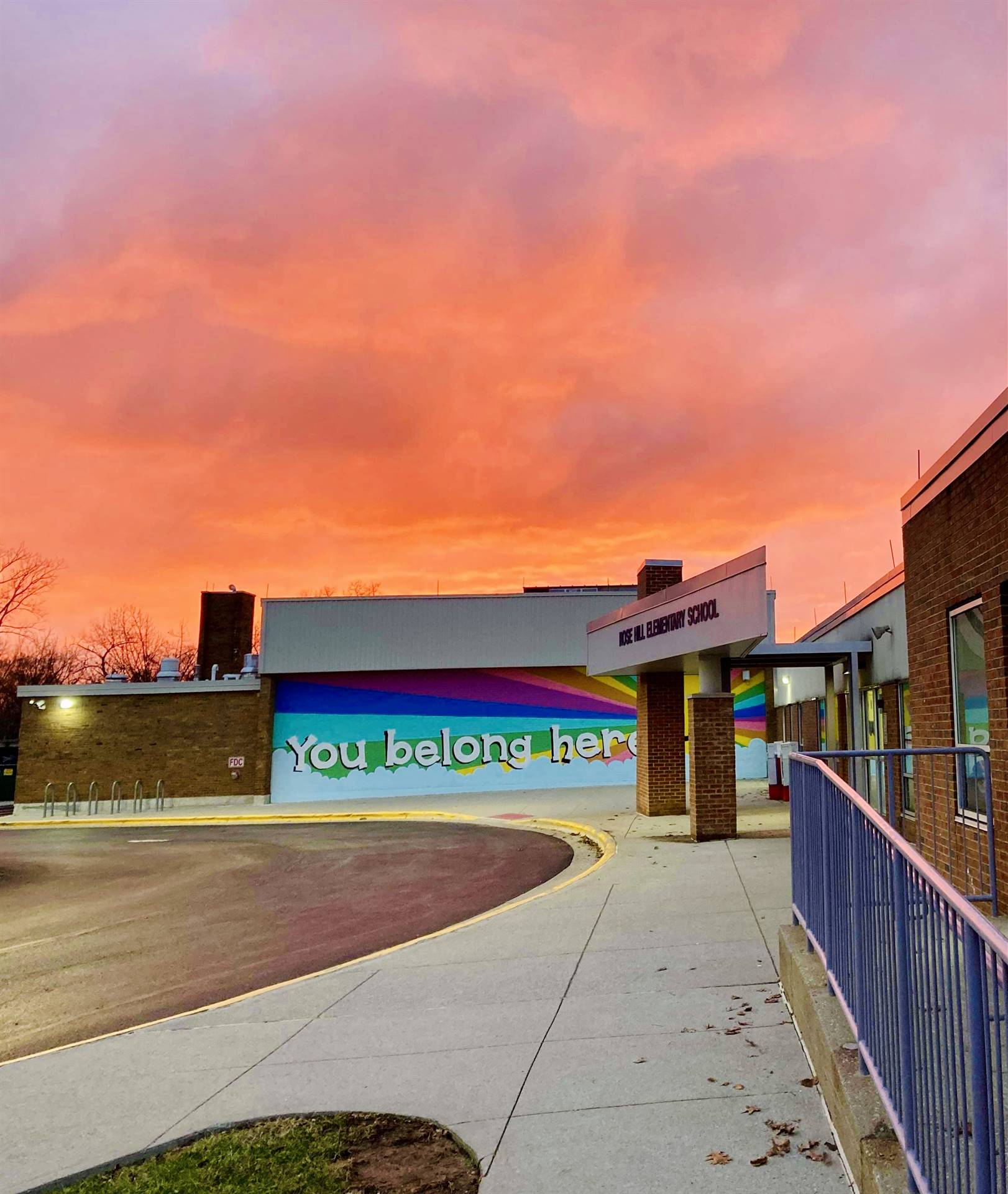 Wall mural that says "you belong here"