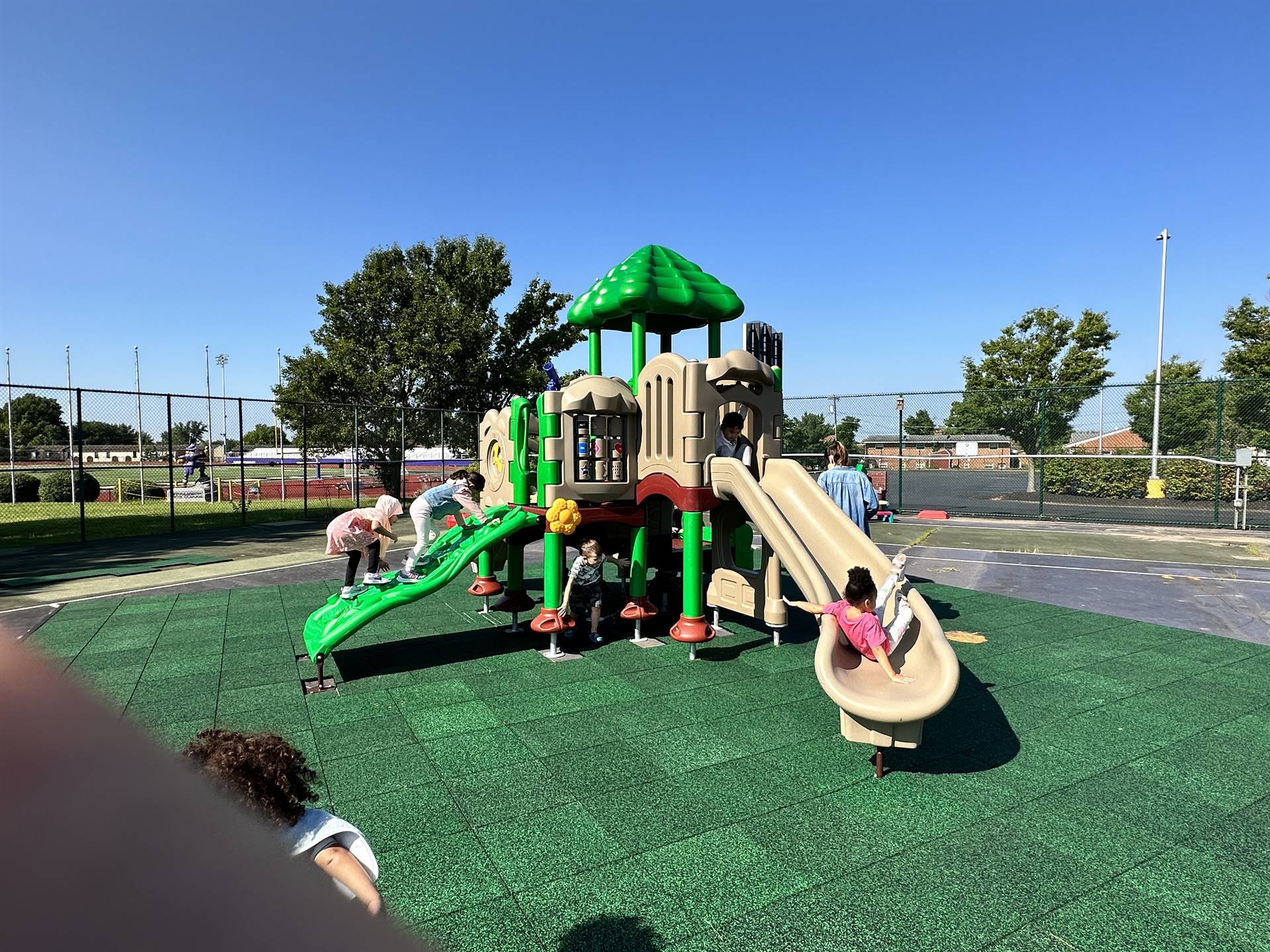 Kids on the playground for the first time. 