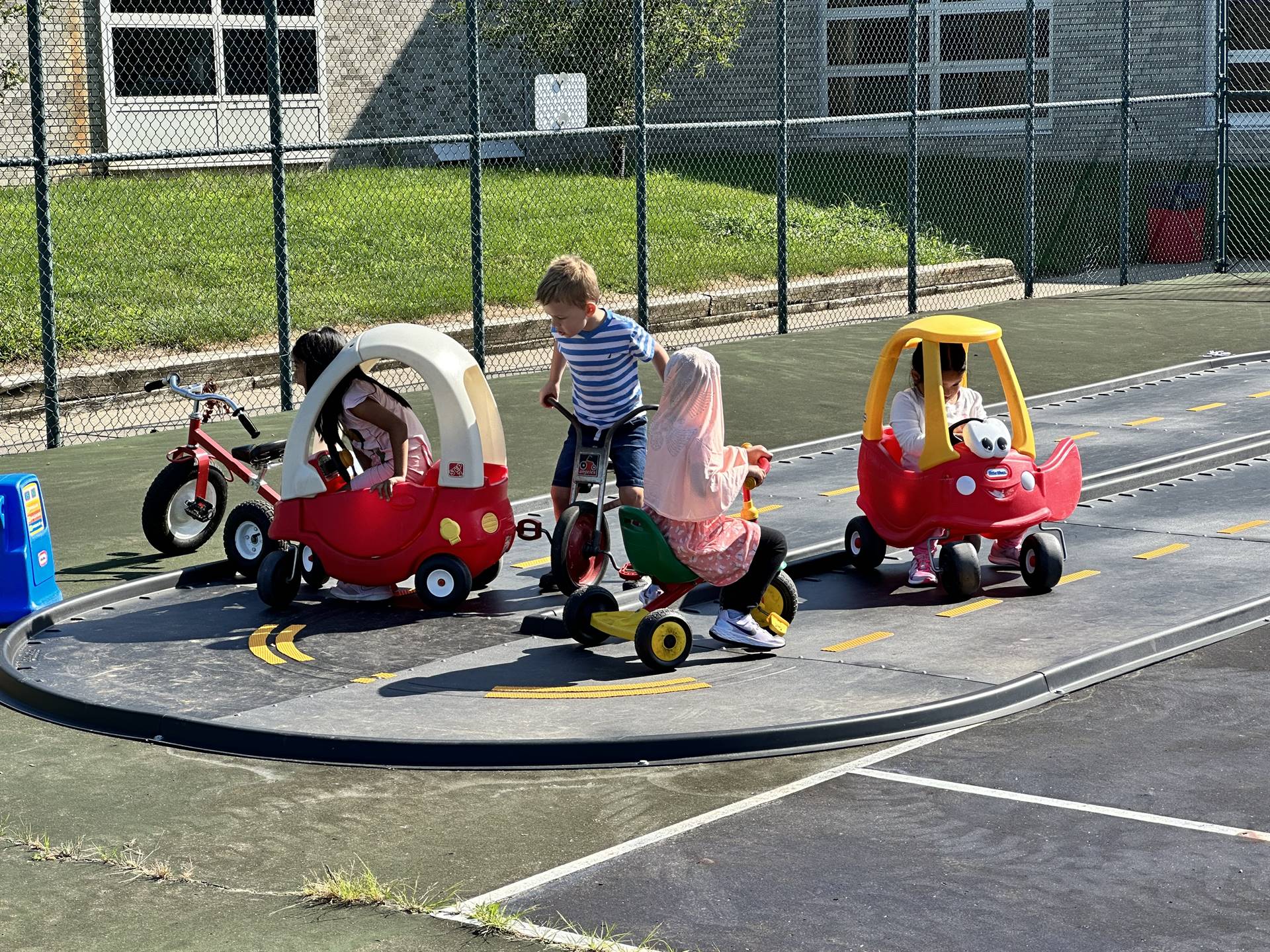 Kids on the playground for the first time. 