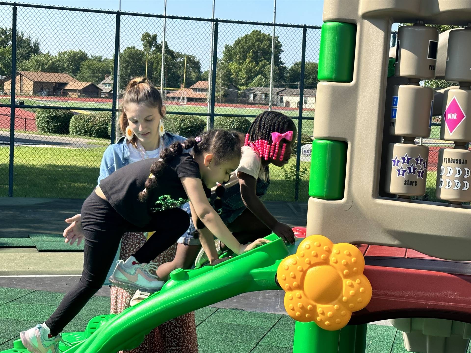 Kids on the playground for the first time. 