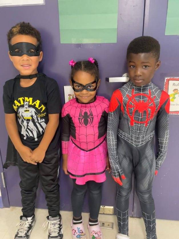 little kids dressed as superheros