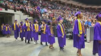 Graduates walk into arena