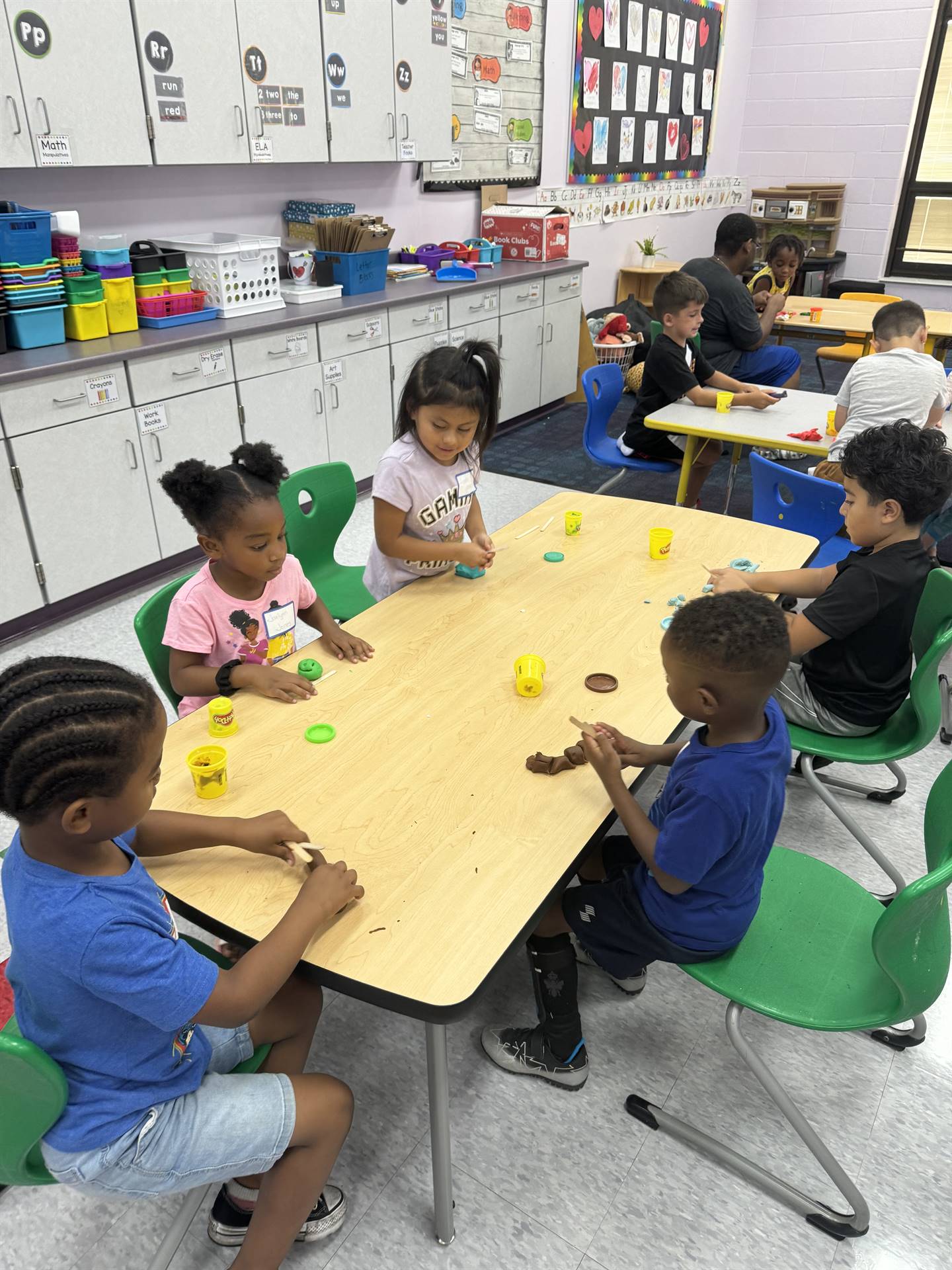 Kindergarteners complete an activity