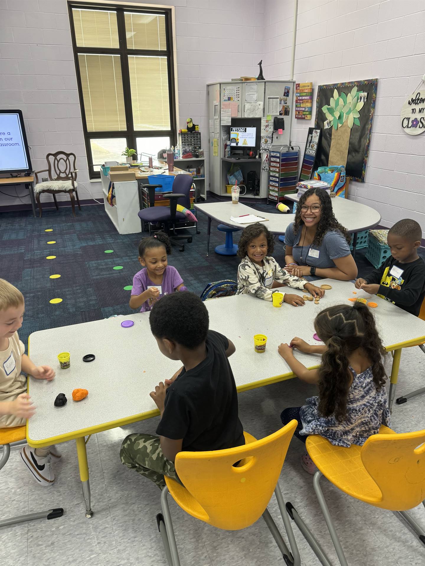 Kindergartners play with play dough.