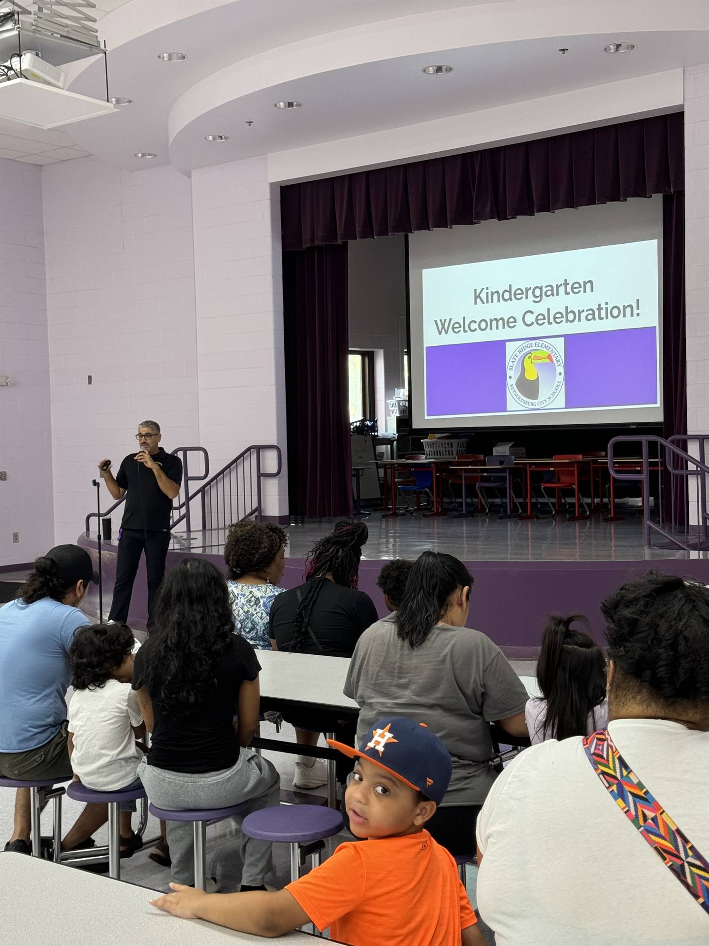 Dr. Parlar welcomes and informs Kindergarten families.
