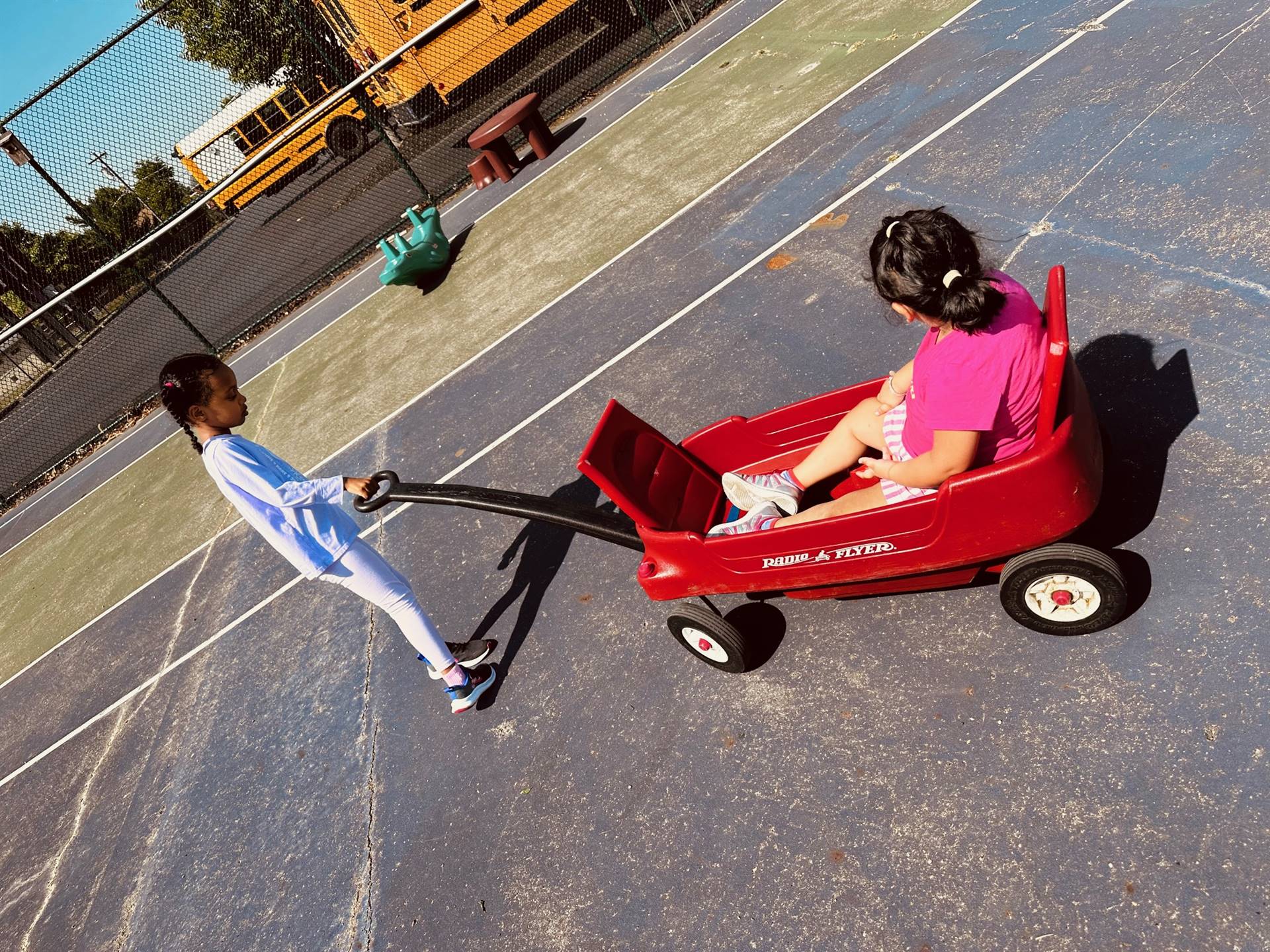 Two students on the playground