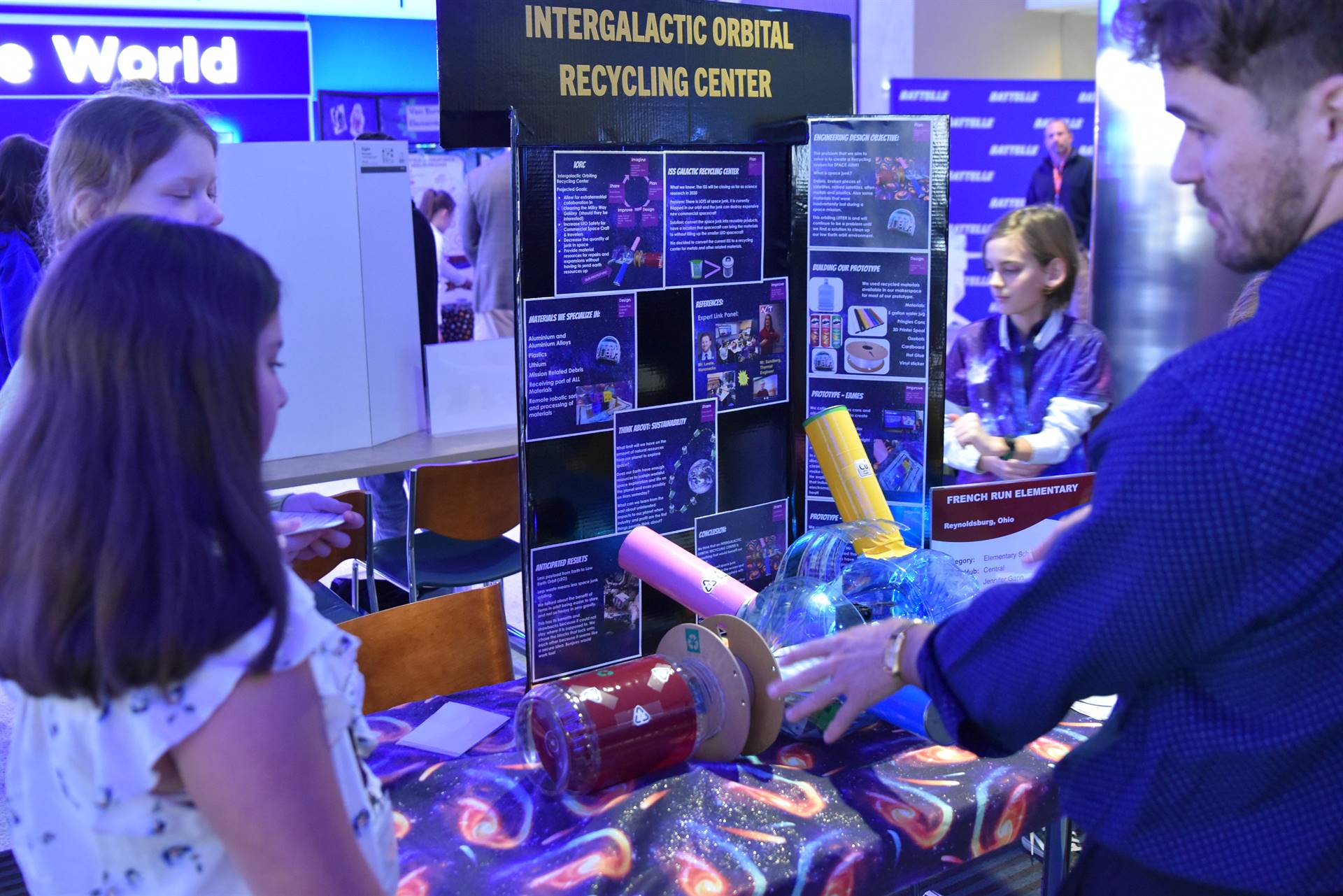 Firebirds present their work to Maximilian Brummel, Voyager Space Mission Manager. 